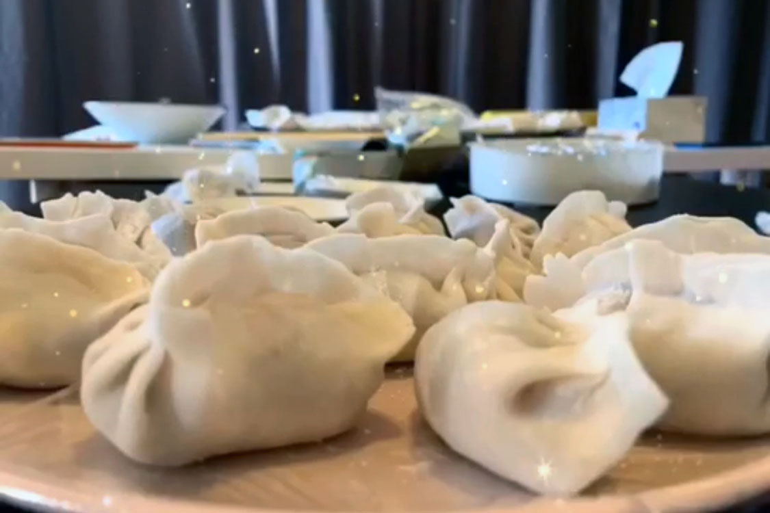 Closeup of a platter of Chinese dumplings.