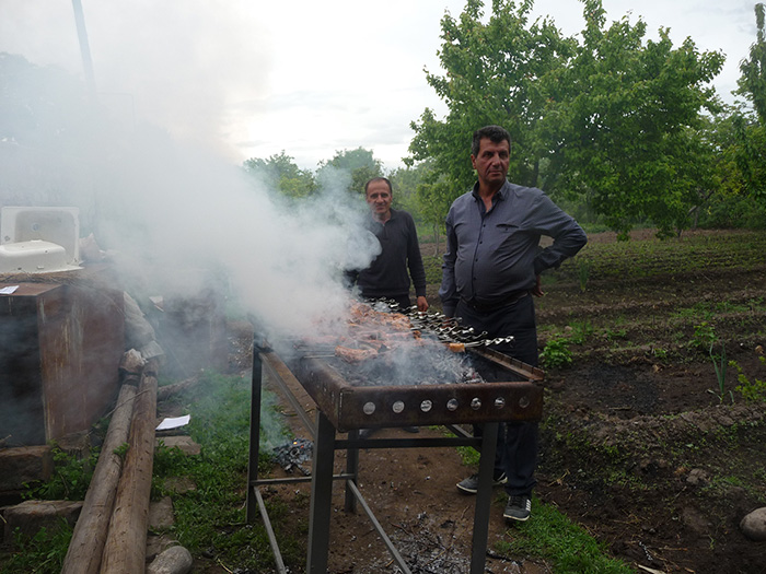The barbecue crew in action. Photo by Betty Belanus, Smithsonian