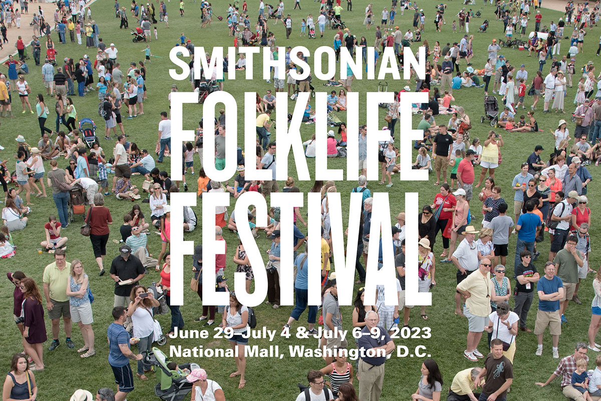 From above, a crowd of people stand in green grass. Superimposed on the image, text in all-caps white block letters: Smithsonian Folklife Festival. June 29-July 4 and July 6-9, National Mall, Washington, D.C.