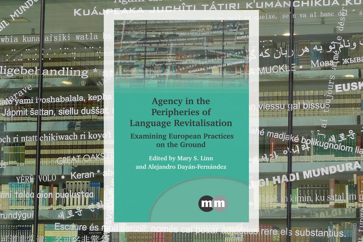 Book cover with title: Agency in the Peripheries of Language Revitalization: Examining European Practices on the Ground. A photo along the upper border of the  book, and in the background, shows a window into a library decorated with phrases in many different languages.