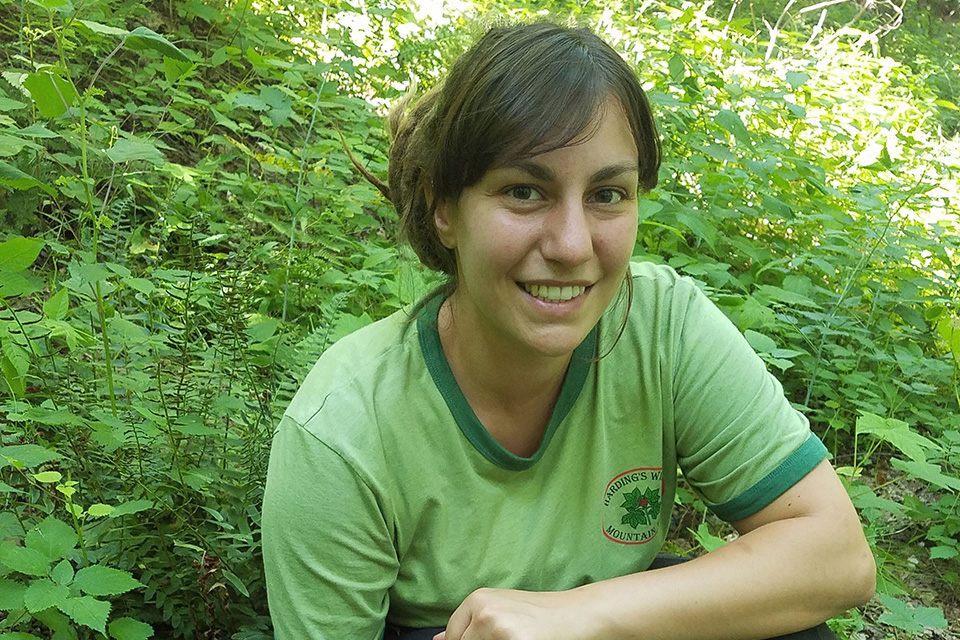 Anna Plattner among wild American ginseng