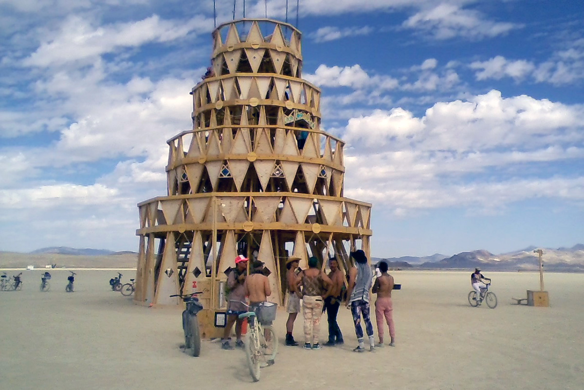 The “Mega Cake” structure was designed by Thom White of Norfolk’s WPA and built by Piece of Cake Productions at Burning Man 2019. Photo by James Deutsch