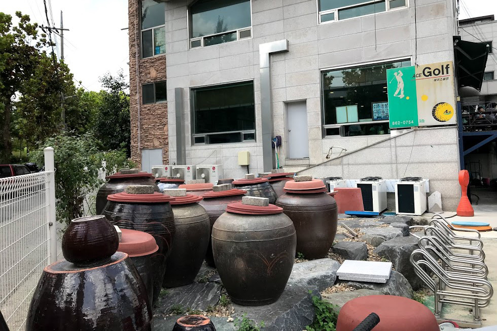 Onggi jars outside a popular cold noodle restaurant in Daejeon, South Korea