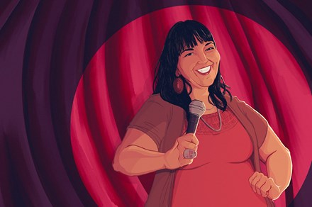 Digital illustration of a woman with long black hair, red beaded earrings, necklaces, and ring, wearing a red dress, smiling broadly. She is spotlit on a stage in front of a red curtain and holding a microphone.