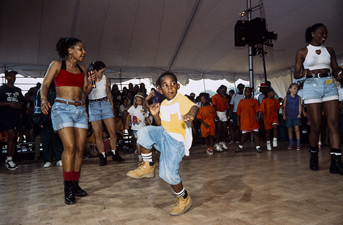 Young visitors try their feet at hip-hop dance at the 1993 Folklife Festival. Photo by Jeff Tinsley, Ralph Rinzler Folklife Archives