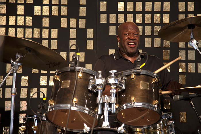 Drummer Bruce Cox with Fred Wesley and the New JBs. Photo by Dan Payn, Ralph Rinzler Folklife Archives